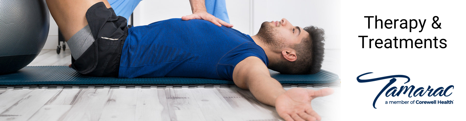 man lying down staging physical therapy exercise